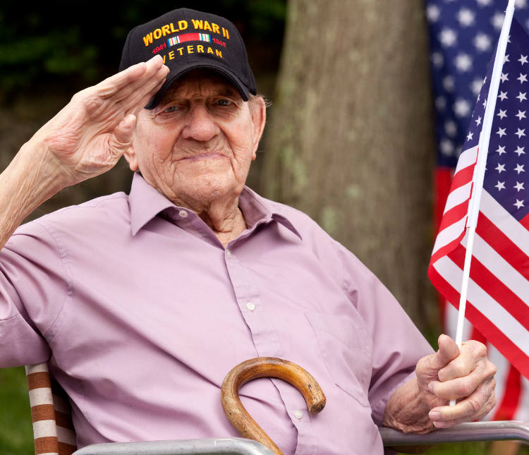 senior man leaning on cane