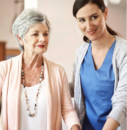 Senior Woman with Female Caregiver